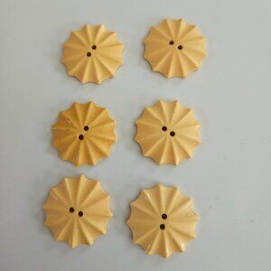 vintage bakelite pinwheel sun shaped buttons butterscotch set of six